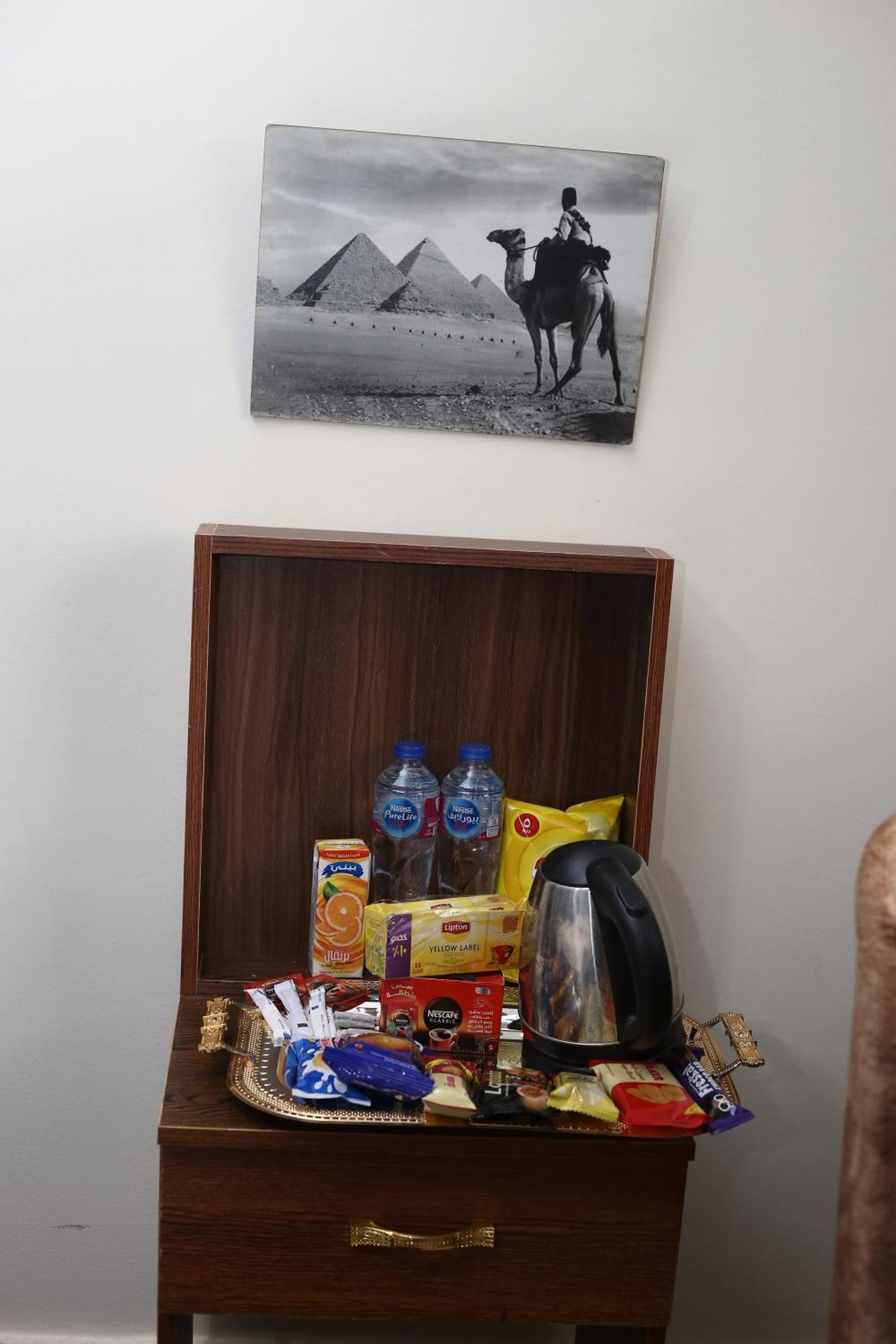 Pyramids Show Hotel Kafret el-Gabal Extérieur photo